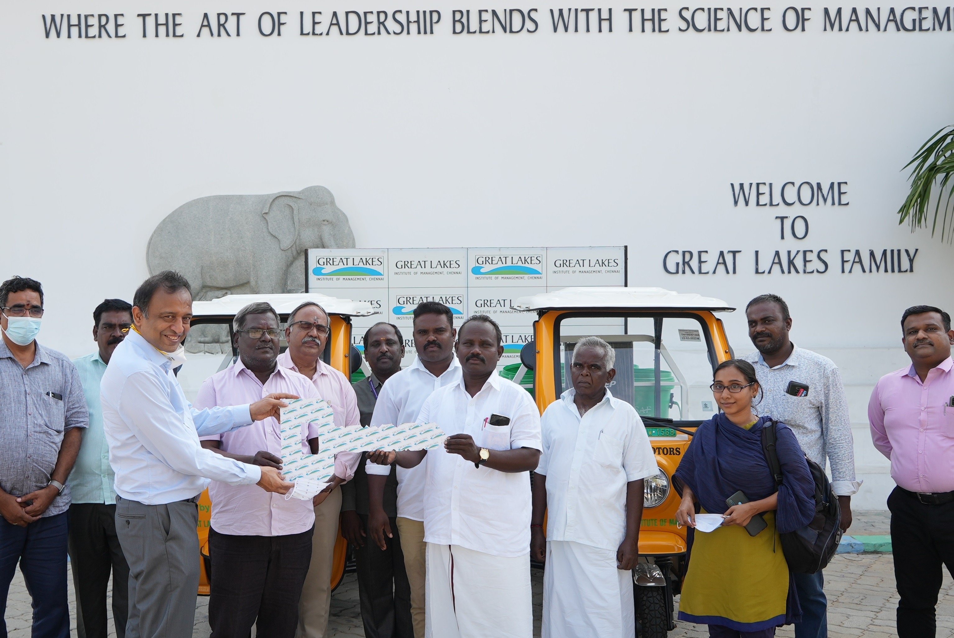 Great Lakes Institute of Management donates two electric garbage collection vehicles to Manamai Village. 